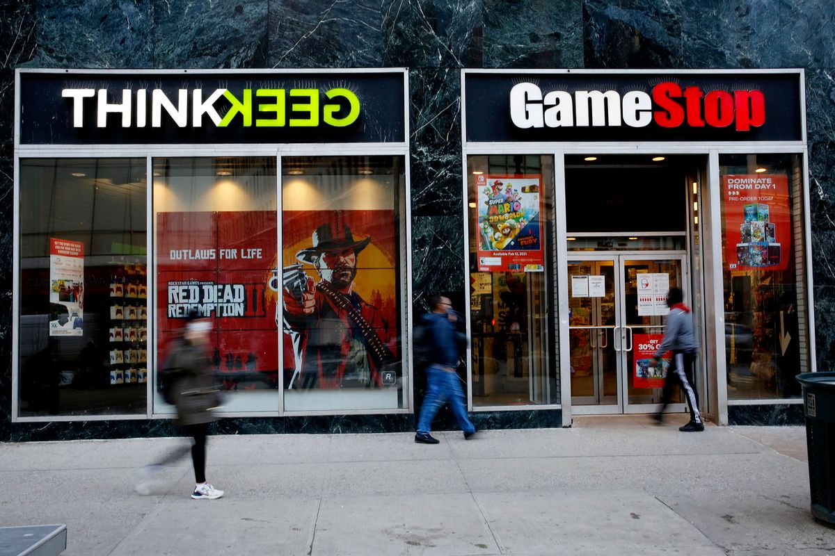 1304134010 NEW YORK, NEW YORK - FEBRUARY 25: People walks in front of GameStop at 6th Avenue on February 25, 2021 in New York. GameStop Corp. doubled its shares and and jumped another 19 percent today and the betting are that GameStop shares would spike to $800 on Friday. (Photo by John Smith/VIEWpress via Getty Images)