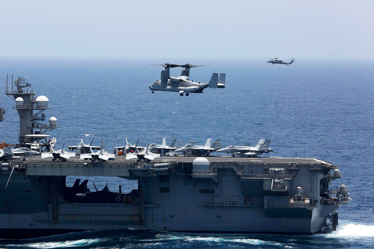 This handout picture released by the US Navy on May 17, 2019 shows an MV-22 Osprey from Marine Medium Tiltrotor Squadron (VMM-264) preparing to land on the flight deck of the Nimitz-class aircraft carrier USS Abraham Lincoln (CVN 72) in the Arabian Sea. - Iran's Foreign Minister Mohammad Javad Zarif said on May 25 that a US decision to deploy 1,500 additional troops to the Middle East is a "threat to international peace," state media reported. "Increased US presence in our region is very dangerous and a threat to international peace and security and must be confronted," Zarif told the official IRNA news agency before heading home from a visit to Pakistan. (Photo by Tristan Kyle Labuguen / Navy Office of Information / AFP) / RESTRICTED TO EDITORIAL USE - MANDATORY CREDIT "AFP PHOTO /US NAVY" - NO MARKETING NO ADVERTISING CAMPAIGNS - DISTRIBUTED AS A SERVICE TO CLIENTS