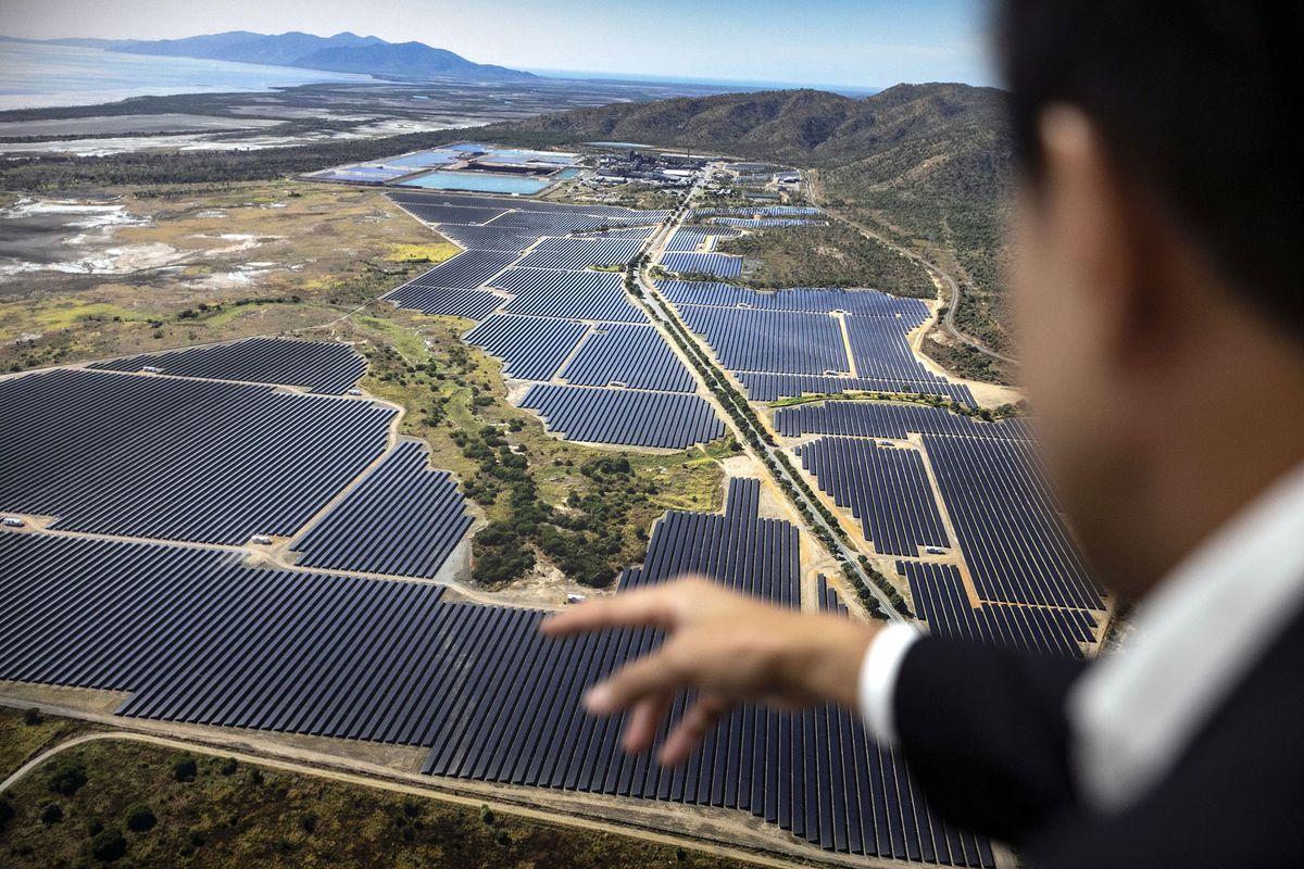 1240631567 Yun Choi, vice chairman of Korea Zinc Co., shows a photo of Sun Metals solar farm in Queensland, Australia, at the company's headquarters in the Gangnam district of Seoul, South Korea, on Tuesday, May 10, 2022. After nearly half a century expanding its bread-and-butter business into one of the worlds largest metal smelting operations, Korea Zinc is setting its sights on renewable energy to cut costs and drive growth. Photographer: Woohae Cho/Bloomberg via Getty Images