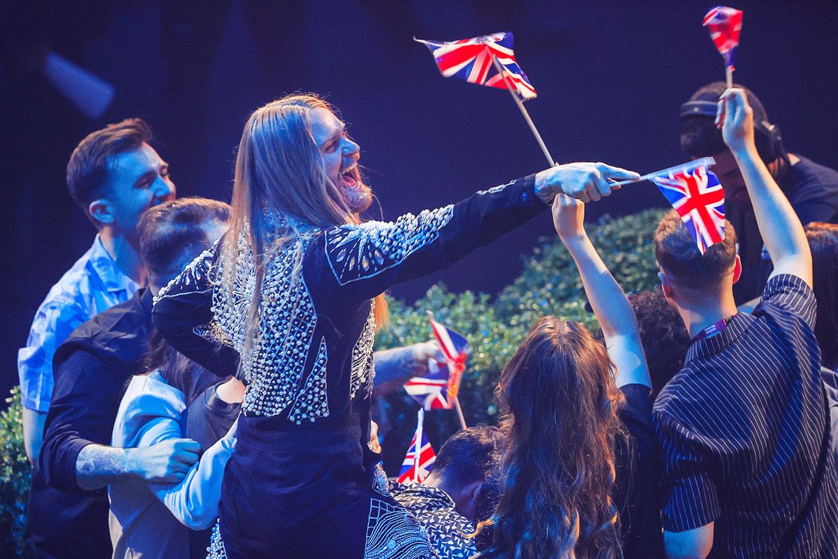 15 May 2022, Italy, Turin: The team around Sam Ryder from Great Britain during the scoring in the final of the Eurovision Song Contest (ESC). The international music competition is being held for the 66th time. In the final are 25 songs of originally 40 music entries. Germany came in last place. Photo: Jens Büttner/dpa (Photo by Jens Büttner/picture alliance via Getty Images)