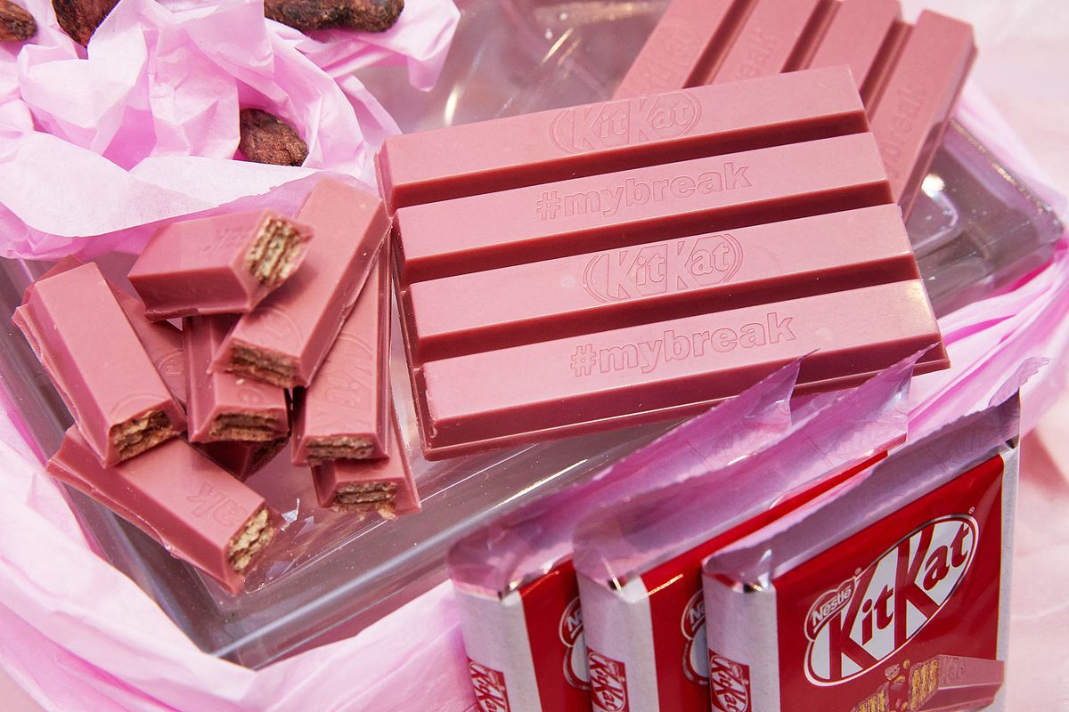 Pink Ruby chocolate from Nestlé Hamburg, 10 April 2018, Germany, Hamburg: An arrangement of pink-coloured Ruby KitKat chocolate bars of food manufacturer Nestlé, is on display during a press meeting of Nestlé Hamburg. Nestlé has launched a campaign for its new KitKat chocolate bar, the  KitKat Ruby, which is made of pink-coloured chocolate. The chocolate bar was made exclusively for the European market and will be available in shops from 7 May. Photo: Georg Wendt/dpa (Photo by Georg Wendt / DPA / dpa Picture-Alliance via AFP)