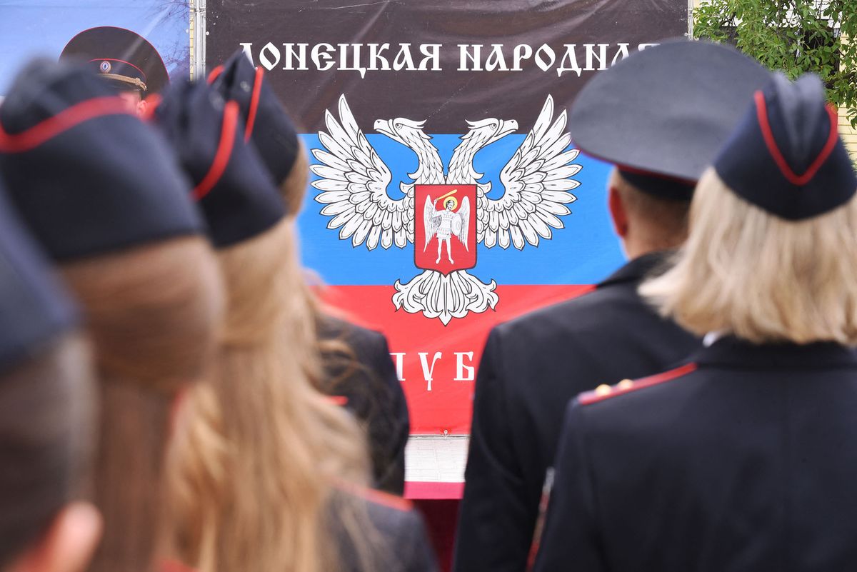 8227673 30.06.2022 Cadets of Academy of Internal Affairs Ministry of the Donetsk People's Republic stand at a graduation ceremony as Russia's military operation in Ukraine continues, in the port city of Mariupol, Donetsk People's Republic. Sergey Baturin / Sputnik (Photo by Sergey Baturin / Sputnik / Sputnik via AFP)