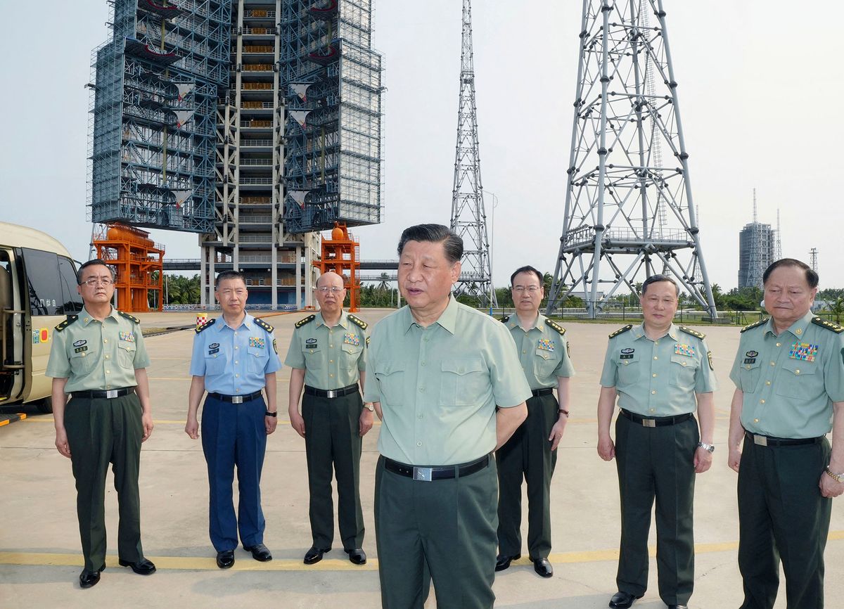 (220414) -- WENCHANG, April 14, 2022 (Xinhua) -- Chinese President Xi Jinping, also general secretary of the Communist Party of China Central Committee and chairman of the Central Military Commission, inspects the launching tower and other facilities at the Wenchang Spacecraft Launch Site in south China's Hainan Province, April 12, 2022. Xi inspected the launch site on Tuesday and extended greetings to all the staff stationed at the site. (Xinhua/Li Gang) (Photo by LI GANG / XINHUA / Xinhua via AFP)