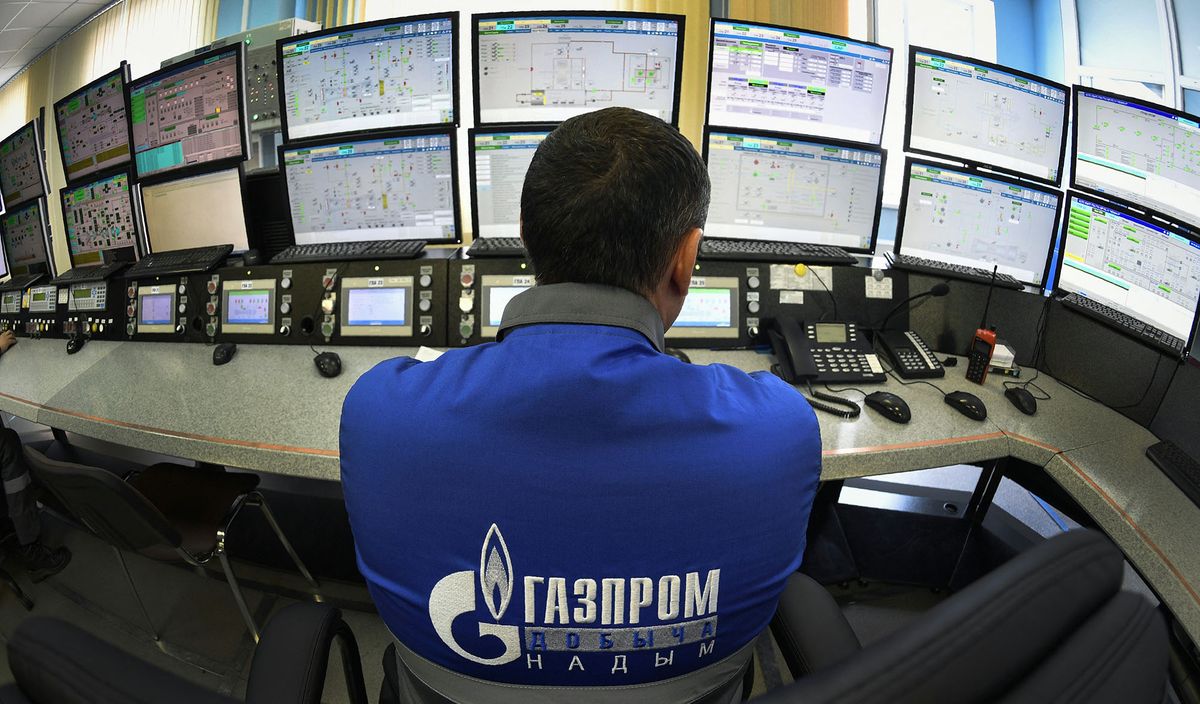 An employee watches monitors in the control panel room at the Bovanenkovo gas field on the Yamal peninsula in the Arctic circle on May 21, 2019. (Photo by Alexander NEMENOV / AFP)