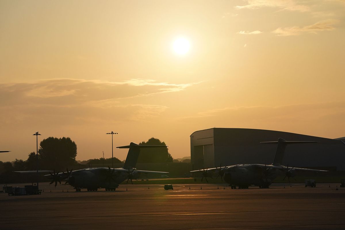 1234932787 A stock picture of two Airbus A400M Atlas transporters parked up at RAF Brize Norton in Oxfordshire. Picture date: Sunday August 29, 2021. (Photo by Jonathan Brady/PA Images via Getty Images)