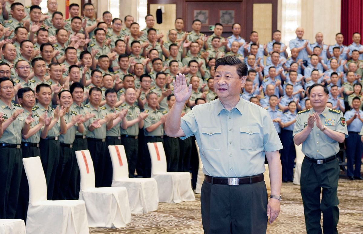 (220715) -- URUMQI, July 15, 2022 (Xinhua) -- Chinese President Xi Jinping, also general secretary of the Communist Party of China Central Committee and chairman of the Central Military Commission, meets with military officers and troops stationed in northwest China's Xinjiang Uygur Autonomous Region, July 15, 2022. Xi made an inspection tour in Xinjiang from Tuesday to Friday. (Xinhua/Li Gang) (Photo by LI GANG / XINHUA / Xinhua via AFP)
