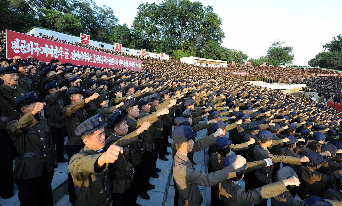 This picture taken on August 11, 2017 and released by North Korea's official Korean Central News Agency (KCNA) on August 12, 2017 shows North Korean youths and workers and trade union members holding a rally to protest the UN Security Council's "sanctions resolution" at the Youth Park Open-Air theatre in Pyongyang. - Nearly a week ago, the UN Security Council unanimously passed fresh sanctions against Pyongyang over its weapons program, including export bans, a new punishment that could cost North Korea $1 billion a year. (Photo by various sources / AFP) / South Korea OUT / REPUBLIC OF KOREA OUT   ---EDITORS NOTE--- RESTRICTED TO EDITORIAL USE - MANDATORY CREDIT "AFP PHOTO/KCNA VIA KNS" - NO MARKETING NO ADVERTISING CAMPAIGNS - DISTRIBUTED AS A SERVICE TO CLIENTSTHIS PICTURE WAS MADE AVAILABLE BY A THIRD PARTY. AFP CAN NOT INDEPENDENTLY VERIFY THE AUTHENTICITY, LOCATION, DATE AND CONTENT OF THIS IMAGE. THIS PHOTO IS DISTRIBUTED EXACTLY AS RECEIVED BY AFP. /