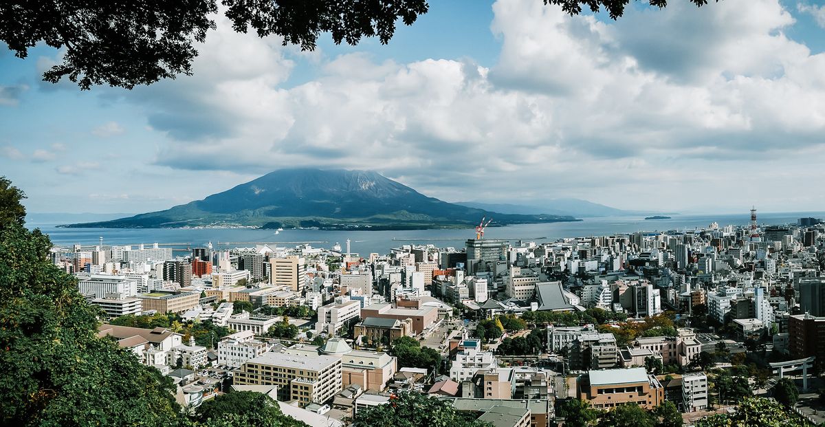 Kagoshima,Cityscape,With,Sakurajima,Mountain, Kagoshima cityscape with Sakurajima mountain
