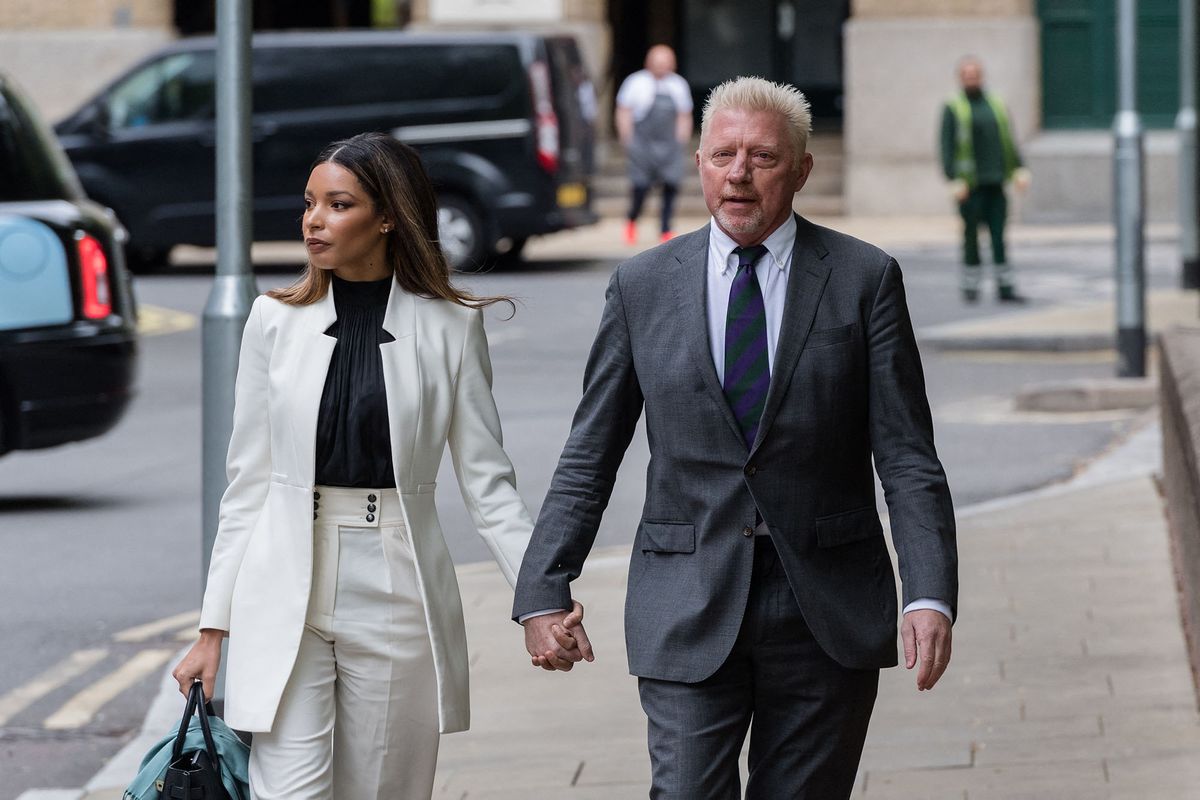 LONDON, UNITED KINGDOM - APRIL 29: Former tennis star Boris Becker (R), accompanied by his partner Lilian De Carvalho Monteiro (L), arrives at the Southwark Crown Court for sentencing after being found guilty of four charges under the Insolvency Act in relation to his bankruptcy, including failing to disclose, concealing and removing significant assets in London, United Kingdom on April 29, 2022. Wiktor Szymanowicz / Anadolu Agency (Photo by Wiktor Szymanowicz / ANADOLU AGENCY / Anadolu Agency via AFP)