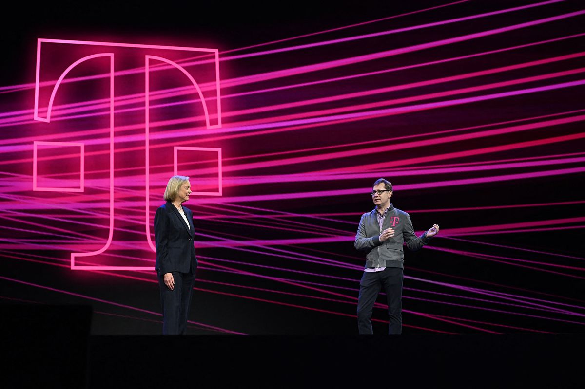 Quibi CEO Meg Whitman (L) and T-Mobile Chief Operating Officer Mike Sievert speak about the short-form video streaming service for mobile Quibi during a keynote address January 8, 2020 at the 2020 Consumer Electronics Show (CES) in Las Vegas, Nevada at the Park Theater at the Park MGM Hotel. (Photo by Robyn Beck / AFP)