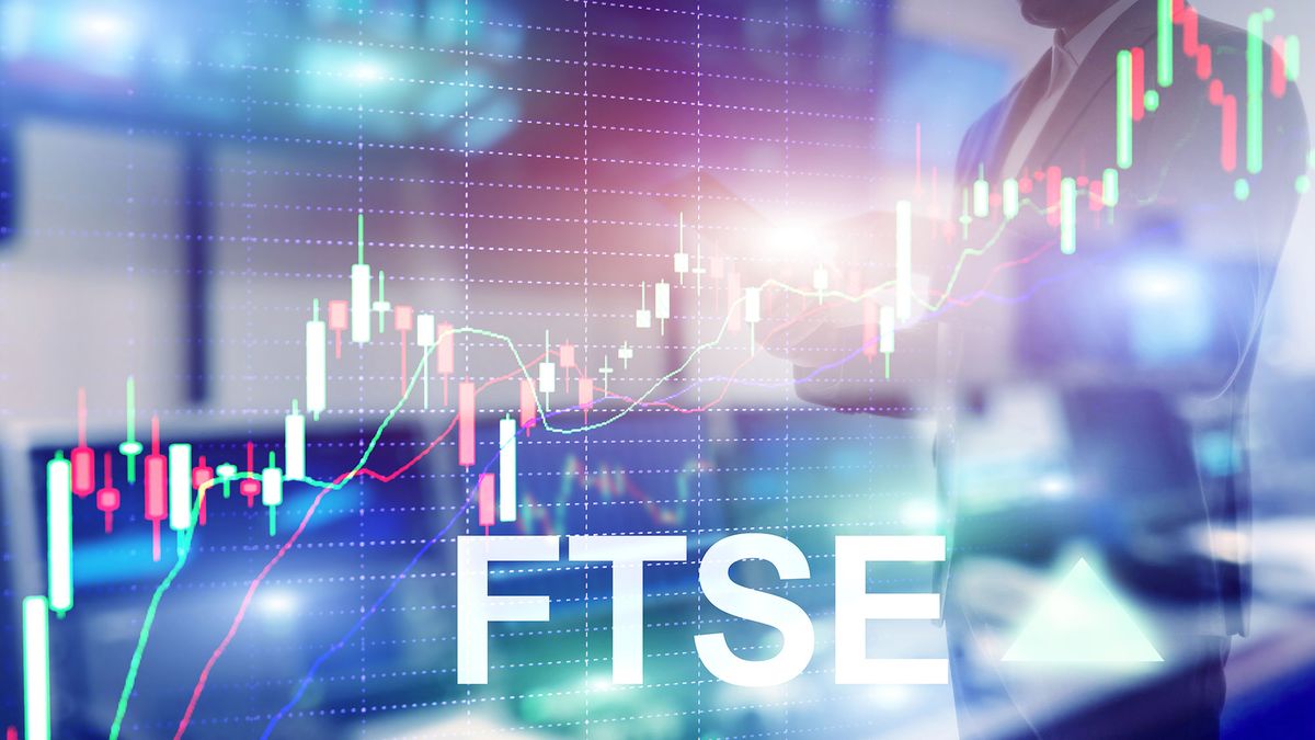 FTSE 100 Financial Times Stock Exchange Index United Kingdom UK England Investment Trading concept with chart and graphs.