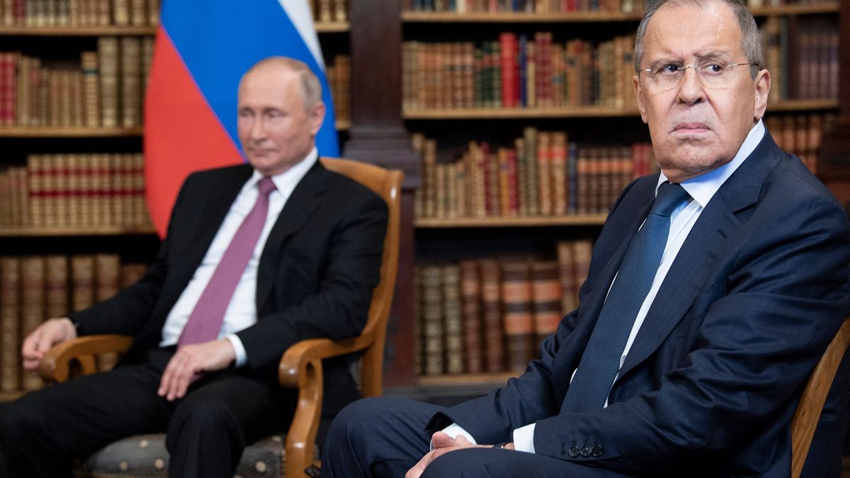 Russian Foreign Minister Sergei Lavrov looks on, next to Russian President Vladimir Putin, as they wait for the US-Russia summit at the Villa La Grange, in Geneva on June 16, 2021. (Photo by Brendan Smialowski / AFP)