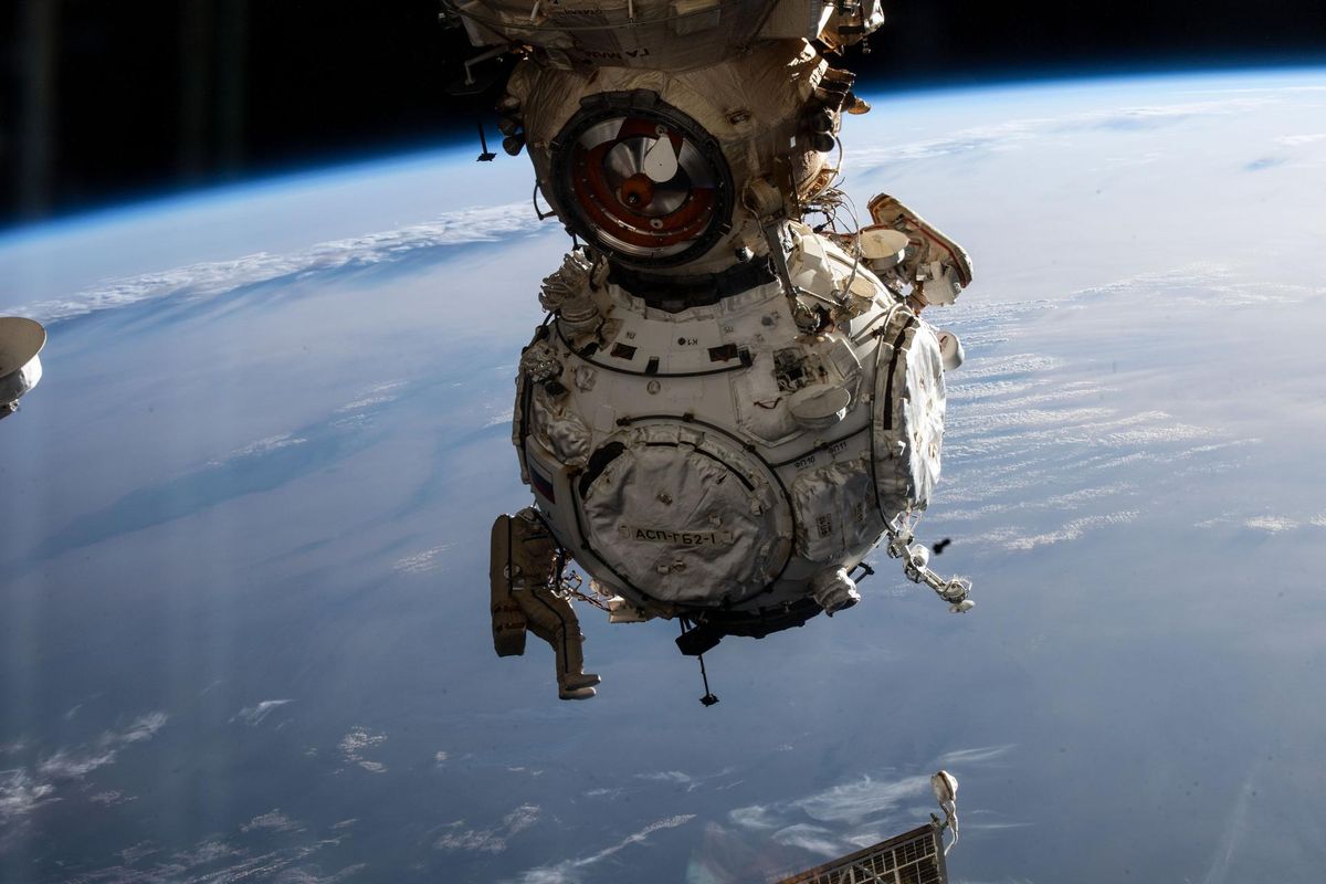 (Jan. 19, 2022) --- Cosmonauts Pyotr Dubrov (attached to the bottom left portion of the Prichal docking module) and Anton Shkaplerov (attached to the top right of Prichal) work to configure and activate Russia's newest module with the Russian segment of the International Space Station during a seven-hour and 11-minute spacewalk.
Date Created: 2022-01-19
Center: JSC
Visit www.nasa.gov/centers/johnson/home/index.html