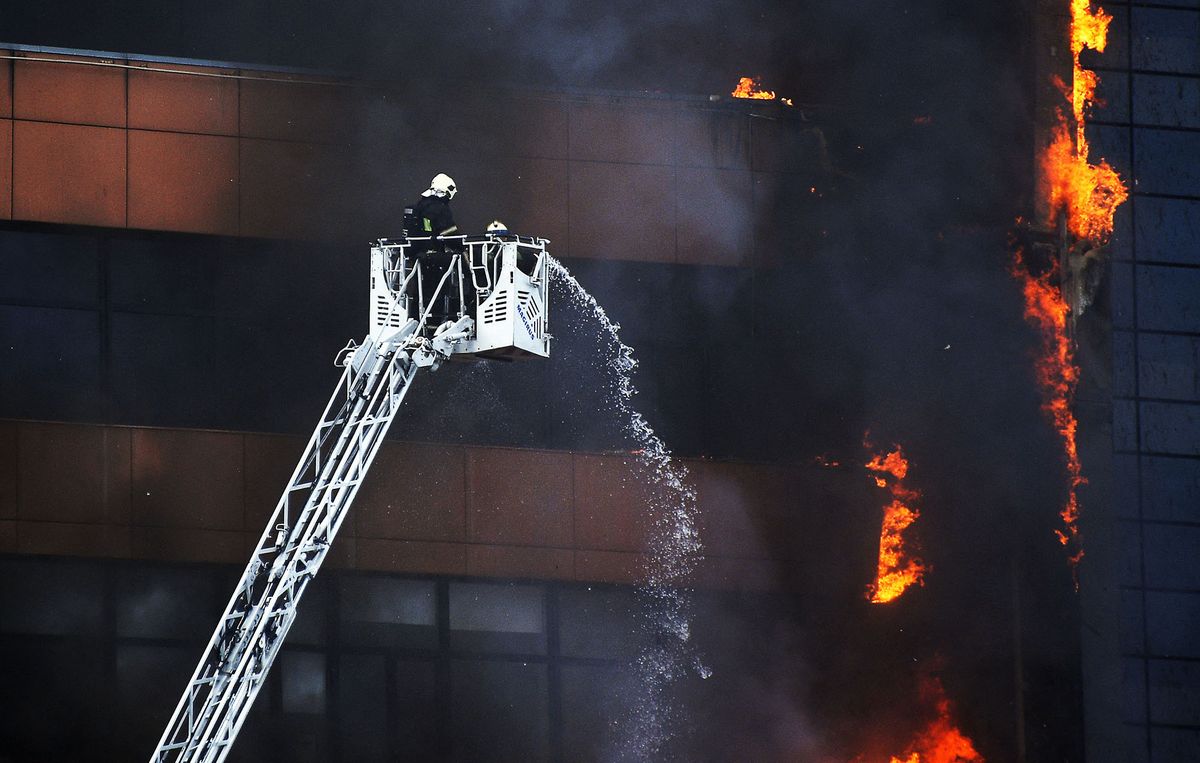 8207591 03.06.2022 Firefighters extinguish fire engulfed a business centre in western Moscow, Russia. Evgeny Odinokov / Sputnik (Photo by Evgeny Odinokov / Sputnik / Sputnik via AFP)