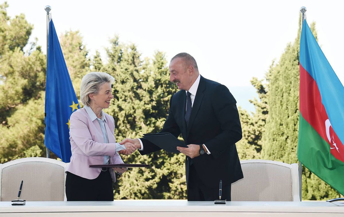 Azerbaijani President Ilham Aliyev and European Commission president Ursula von der Leyen attend a signing ceremony in Baku on July 18, 2022. - The European Union and Azerbaijan on July 18, 2022 signed an agreement to double gas imports from the energy-rich Caspian nation to Europe which seeks non-Russian suppliers after Moscow's invasion of Ukraine. (Photo by Handout / Azerbaijani presidency / AFP) / RESTRICTED TO EDITORIAL USE - MANDATORY CREDIT "AFP PHOTO / Azerbaijani presidency / handout" - NO MARKETING NO ADVERTISING CAMPAIGNS - DISTRIBUTED AS A SERVICE TO CLIENTS