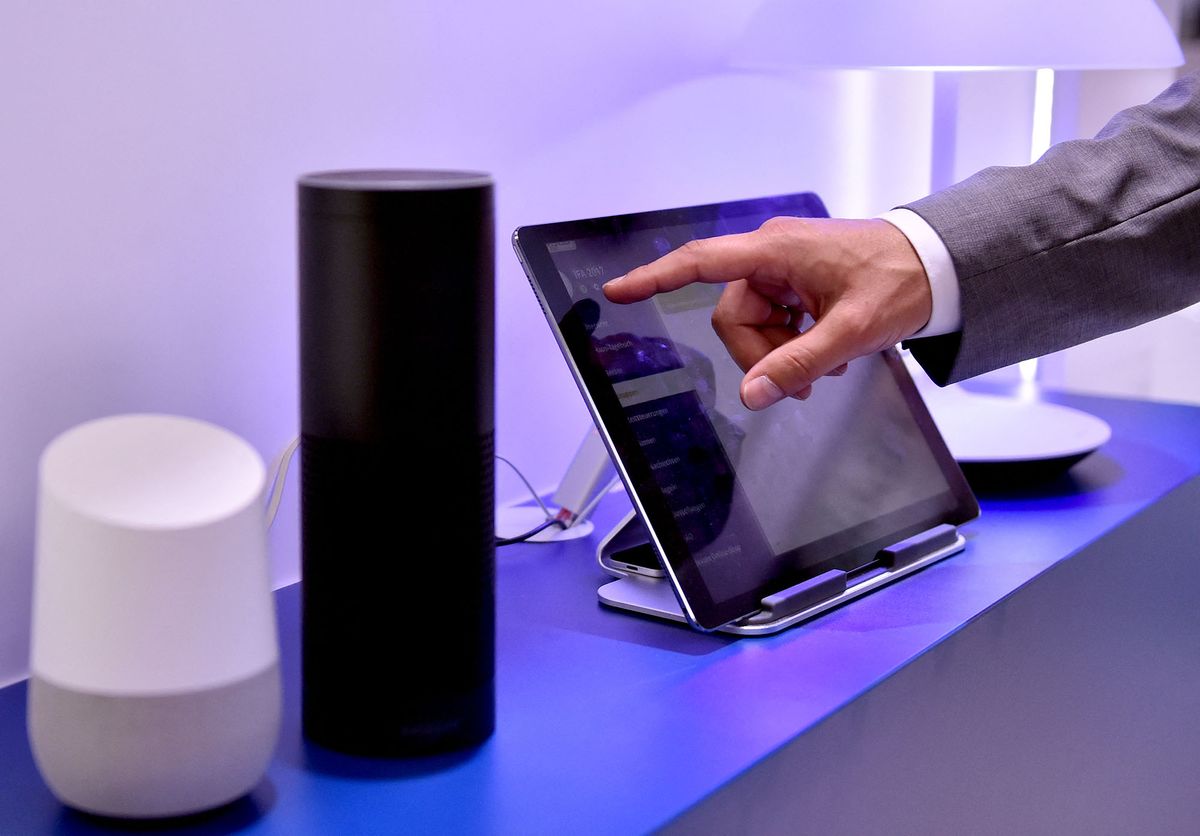 The Google Assistant speaker and Amazon's Echo - Alexa Voice Service presented at the IFA in Berlin, Germany, 1 September 2017. Photo: Britta Pedersen/dpa-Zentralbild/ZB (Photo by BRITTA PEDERSEN / ZB / dpa Picture-Alliance via AFP)