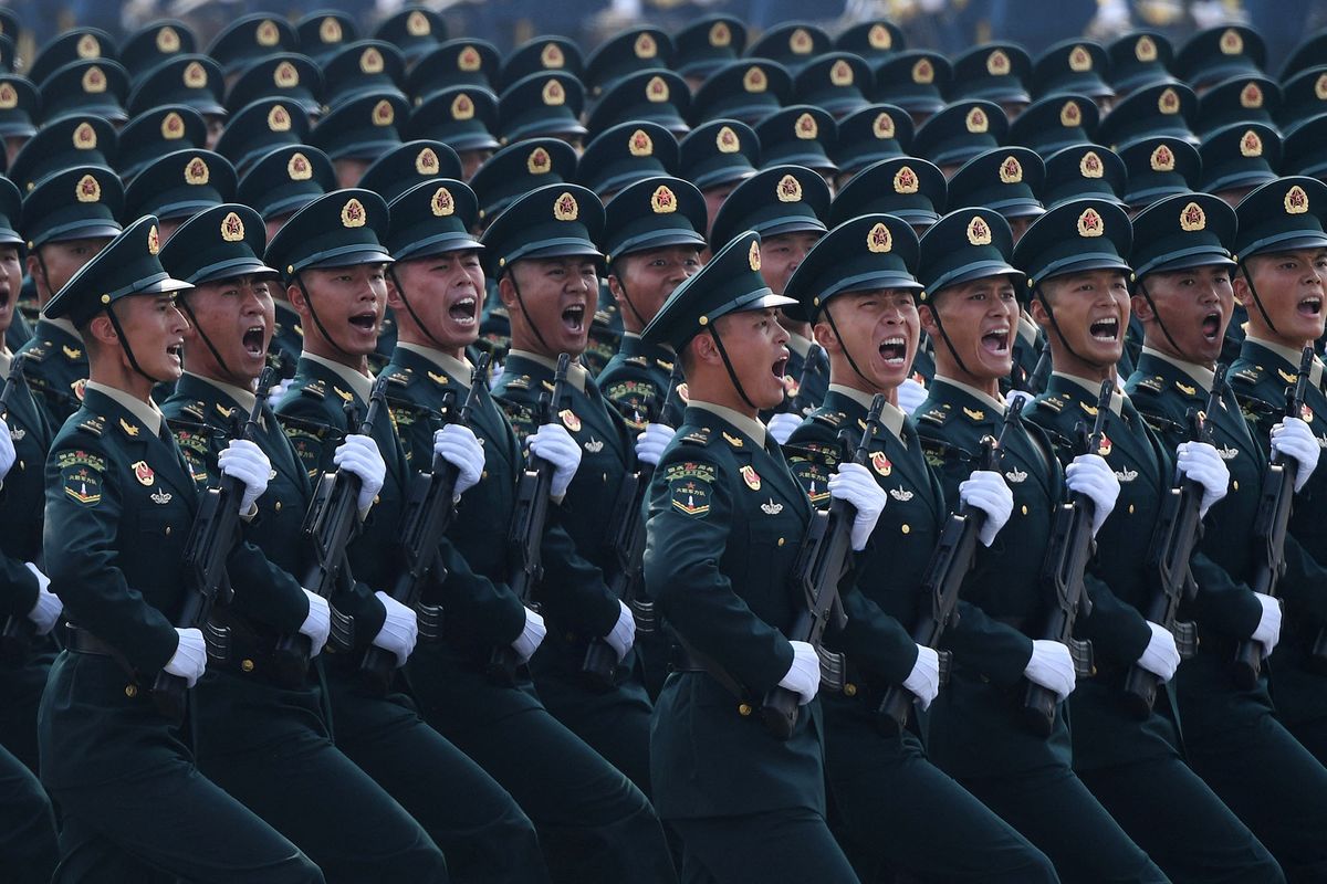 Chinese troops march during a military parade in Tiananmen Square in Beijing on October 1, 2019, to mark the 70th anniversary of the founding of the People’s Republic of China. (Photo by Greg BAKER / AFP)