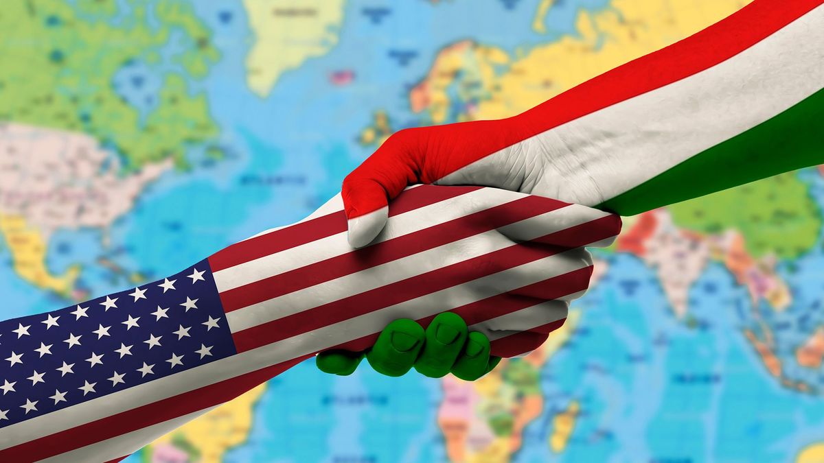 Flags,Hungary,And,United,States,Countries,,Handshake,Cooperation,,Partnership,And, Flags Hungary and United States countries, handshake cooperation, partnership and friendship or sports competition.With background of world map
