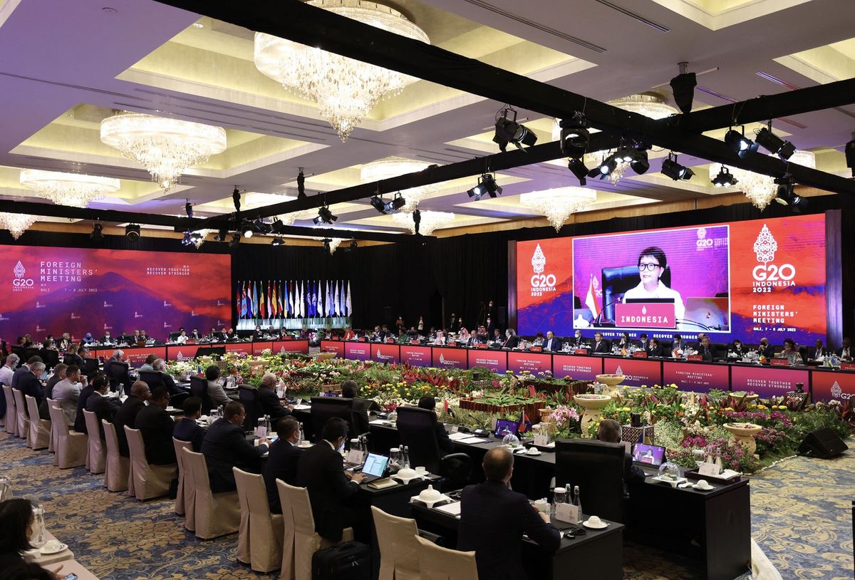 BALI, INDONESIA - JULY 8: Indonesia Minister of Foreign Affairs Retno Marsudi (on screen), delivers a speech during the G20 Foreign Ministers' Meeting in Bali, Indonesia, on July 8, 2022. Fatih Aktas / Anadolu Agency (Photo by Fatih Aktas / ANADOLU AGENCY / Anadolu Agency via AFP)