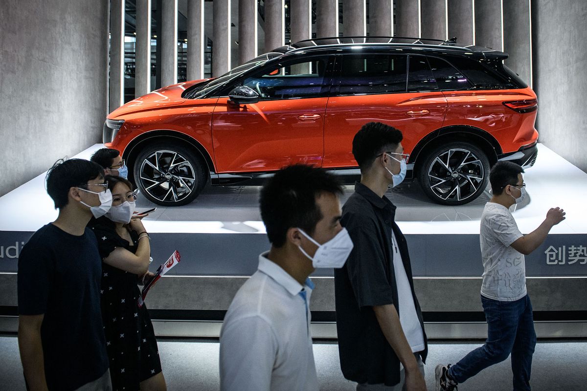 SHENZHEN, CHINA - JUNE 5:Customers are seen during the Guangdong-Hong Kong-Macao Greater Bay Area International Auto Show 2022 at Shenzhen Convention and Exhibition Center on June 5, 2022 in Shenzhen, Guangdong Province of China. Stringer / Anadolu Agency (Photo by STRINGER / ANADOLU AGENCY / Anadolu Agency via AFP)