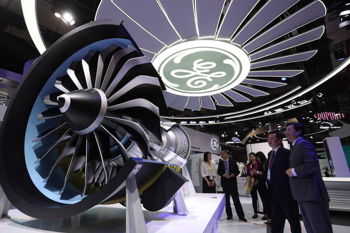 SHANGHAI, CHINA - NOVEMBER 05: People look at a LEAP engine demonstration model from General Electric Company on day one of the 2nd China International Import Expo (CIIE) at the National Exhibition and Convention Center on November 5, 2019 in Shanghai, China. More than 3,000 companies from over 150 countries and regions participate in The 2nd China International Import Expo (CIIE) from November 5 to 10 in Shanghai. (Photo by Zhang Hengwei/China News Service/VCG via Getty Images)