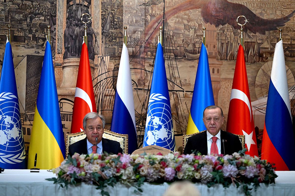 United Nations (UN) Secretary-General Antonio Guterres (L) and Turkish President Recep Tayyip Erdogan (R) sit at the start of the signature ceremony of an initiative on the safe transportation of grain and foodstuffs from Ukrainian ports, in Istanbul, on July 22, 2022. - As a first major agreement between the warring parties since the invasion, Ukraine and Russia are expected to sign a deal in Istanbul today to free up the export of grain from Ukrainian ports. The deal has been brokered by the UN and Turkey. (Photo by OZAN KOSE / AFP)