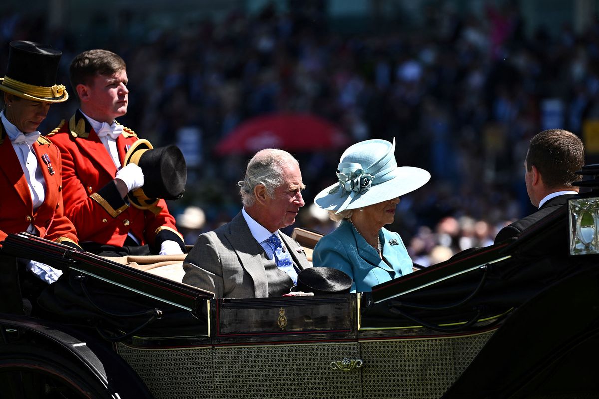 Britain's Prince Charles, Prince of Wales and Britain's Camilla, Duchess of Cornwall arrive to attend the first day of the Royal Ascot horse racing meet, in Ascot, west of London on June 14, 2022. (Photo by Ben Stansall / AFP)