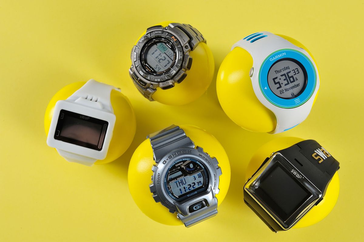 176917924 A selection of gadget watches: (clockwise from top left) Casio Pro Trek PRG-240T, Garmin Forerunner 610, sWaP Active, Casio G-Shock GB-6900 Bluetooth and sWaP Rebel photographed during a studio shoot for Official Windows Magazine, November 22, 2012. (Photo by David Caudery/Official Windows Magazine via Getty Images)