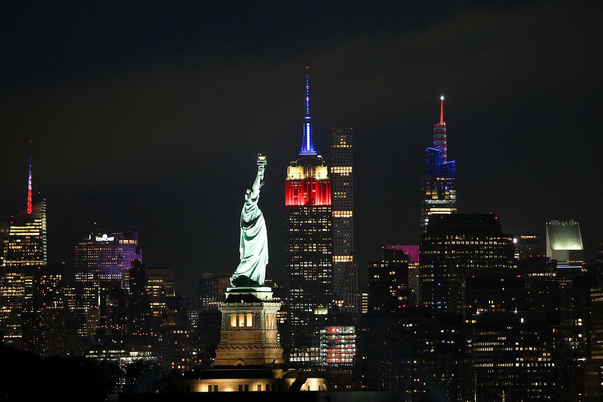 NEW YORK, NY - JULY 4TH: The Statue of Liberty and Empire State Building are seen as 4th of July is celebrated in New York City, United States on July 4, 2022. Tayfun Co≈ükun / Anadolu Agency (Photo by Tayfun Co≈ükun / ANADOLU AGENCY / Anadolu Agency via AFP)