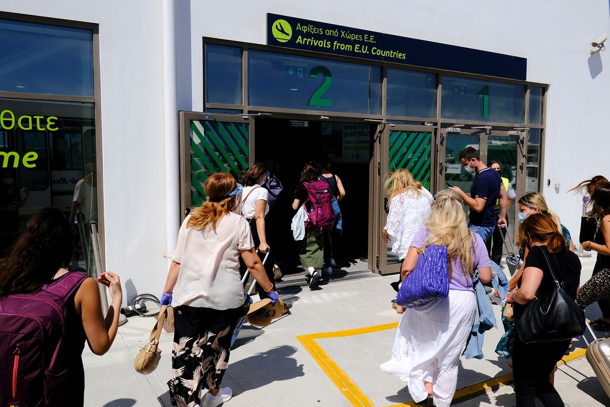 Passengers,Arrive,From,Schengen,Area,In,Santorini,Airport,In,Greece