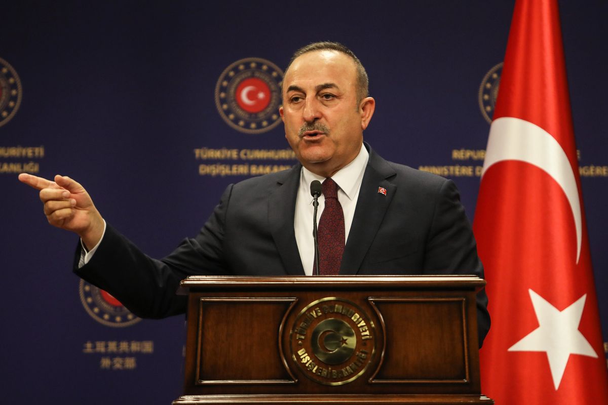 British Foreign Secretary Visits Turkey To Show Support In Syrian Conflict, ANKARA, TURKEY - MARCH 03: Minister of Foreign Affairs of Turkey, Mevlut Cavusoglu speaks at a joint press conferance after his meeting with British Foreign Secretary Dominic Raab on March 03, 2020 in Ankara, Turkey. Mr. Raab appeared in Ankara to express solidarity with the NATO ally in its conflict with the Syrian regime and its proxies. The increasing violence in Syria's Idlib province, where at least 33 Turkish troops were recently killed in an airstrike, has displaced hundreds of thousands of people and posed the risk of escalating conflict between Turkey and Syria's main military ally, Russia. (Photo by Getty Images/Getty Images)