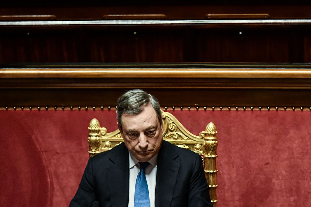 Italy's Prime Minister, Mario Draghi listens to Senators responding after he addressed the Italian Senate in Rome on June 21, 2022 ahead of a June 23-24 European Union summit expected to formalise the candidacies of both Ukraine and neighbouring Moldova. (Photo by Filippo MONTEFORTE / AFP)