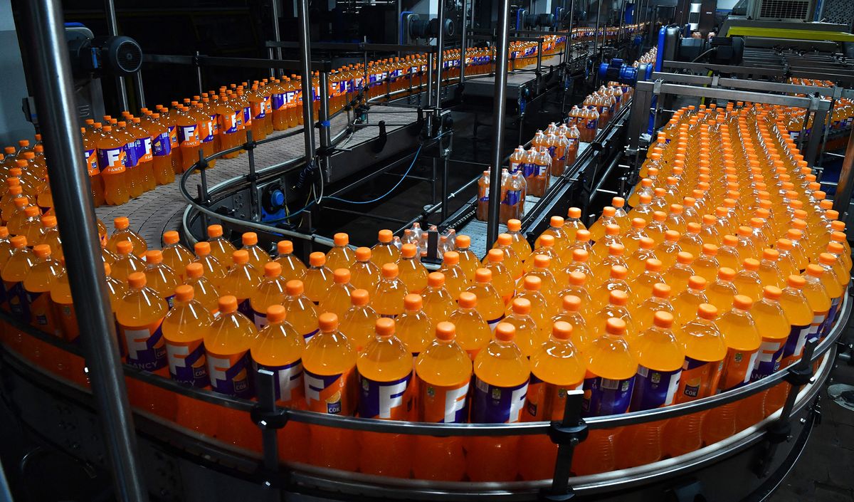8198790 24.05.2022 A view shows bottles of the Fancy sparkling soft drink at the Ochakovo Beer and Non-Alcoholic Beverage Plant in Moscow, Russia. CoolCola, Fancy and Street are brands analogous to Coca-Cola, Fanta and Sprite. Evgeny Biyatov / Sputnik (Photo by Evgeny Biyatov / Sputnik / Sputnik via AFP)