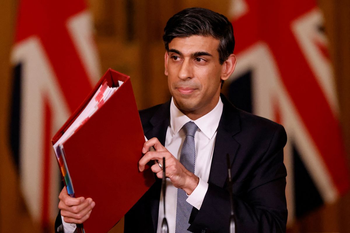 Britain's Chancellor of the Exchequer Rishi Sunak attends a virtual press conference inside 10 Downing Street in central London on March 3, 2021, following his earlier Budget. - Britain on Wednesday sharply cut the growth forecast of its coronavirus-ravaged economy, warning the pandemic was still causing "profound damage" in an annual budget centred on safeguarding businesses and jobs. (Photo by Tolga Akmen / various sources / AFP)