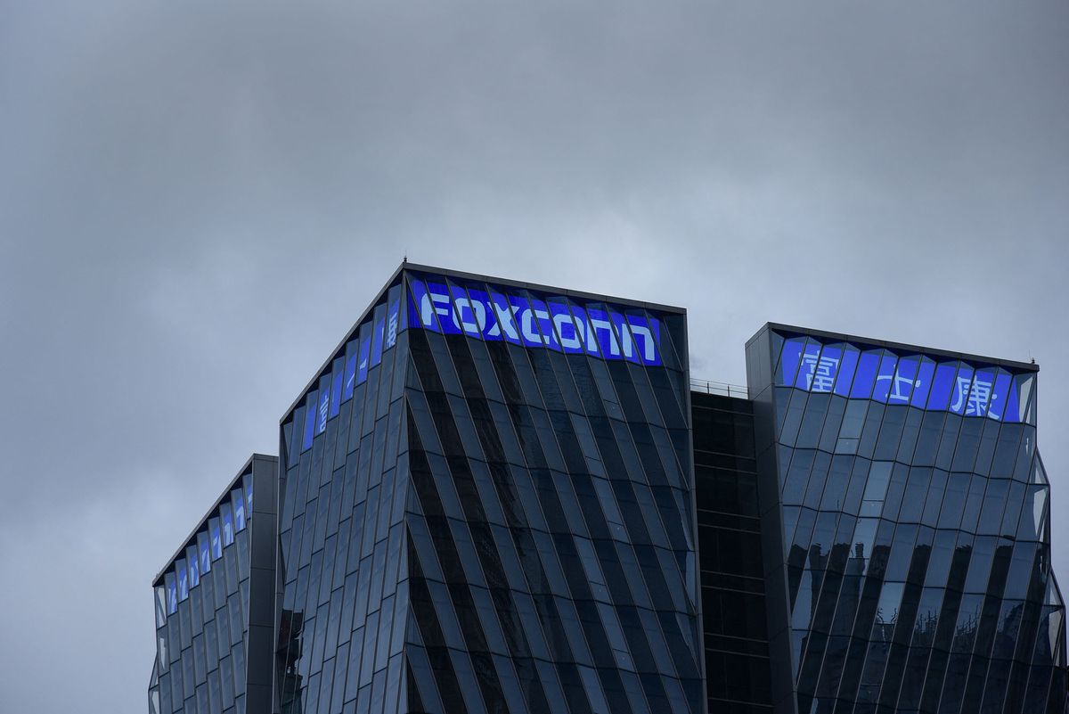 --File--Photo taken on 10 February shows the Shanghai Foxconn Headquarters in Shanghai, China, 10 February 2021. (Photo by stringer / Imaginechina via AFP)