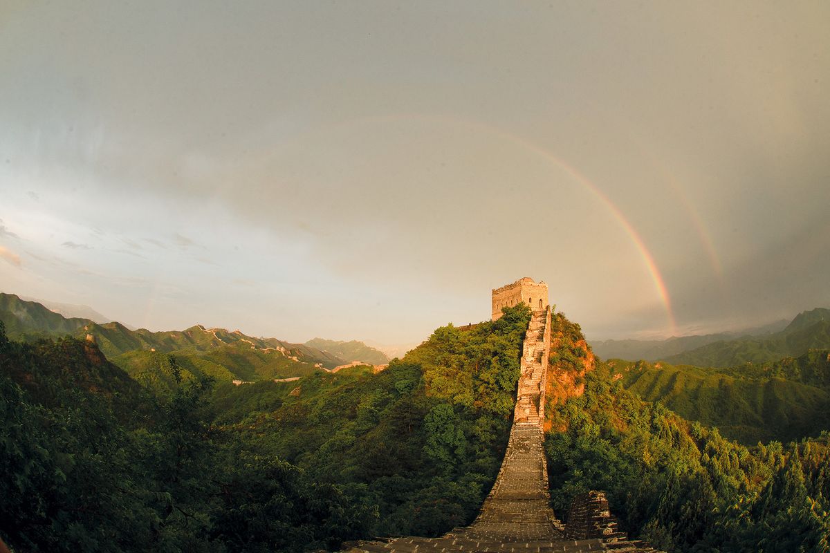 (220615) -- LUANPING, June 15, 2022 (Xinhua) -- A double rainbow appears in the sky over the Jinshanling Great Wall in Luanping County, north China's Hebei Province, June 14, 2022. (Photo by Zhou Wanping/Xinhua) (Photo by Zhou Wanping / XINHUA / Xinhua via AFP)