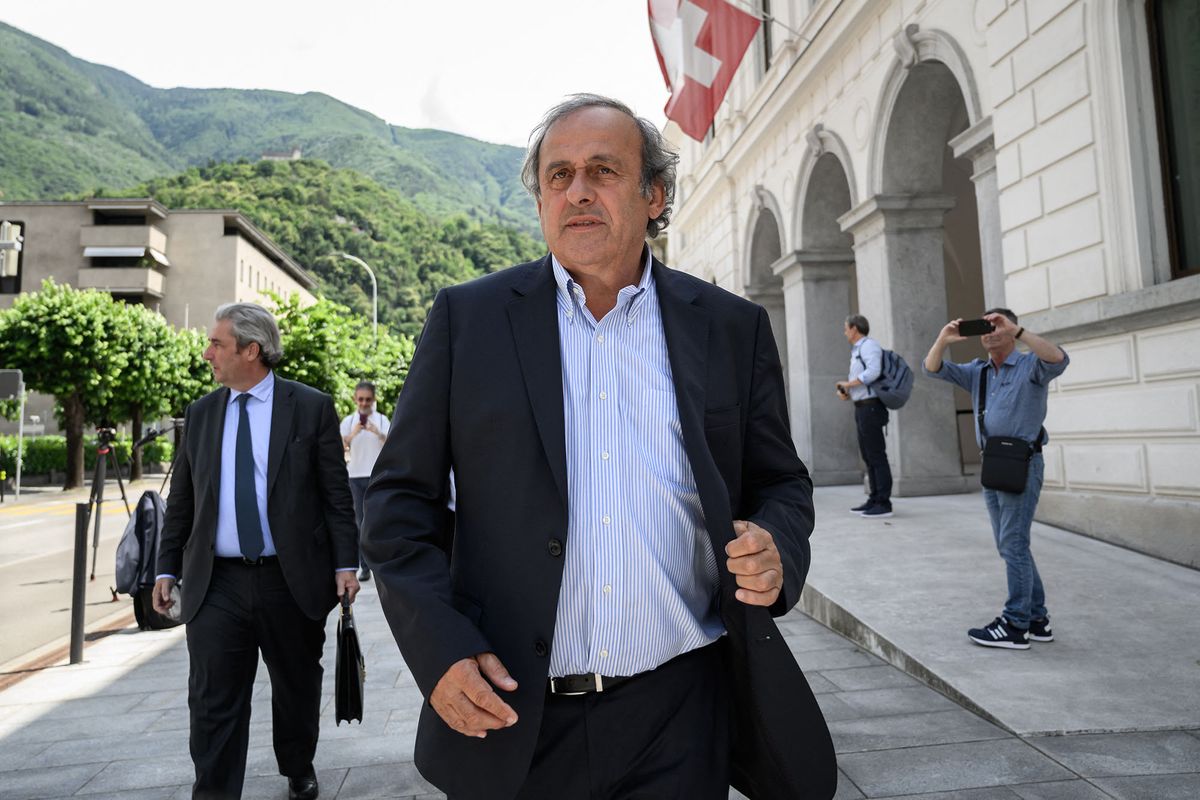 Former UEFA president Michel Platini leaves Switzerland's Federal Criminal Court after the first day of his trial over a suspected fraudulent payment in the southern Switzerland city of Bellinzona on June 8, 2022. - Sepp Blatter and Michel Platini, once the chiefs of world and European football start a two-week trial following a mammoth investigation that began in 2015 and lasted six years. (Photo by Fabrice COFFRINI / AFP)