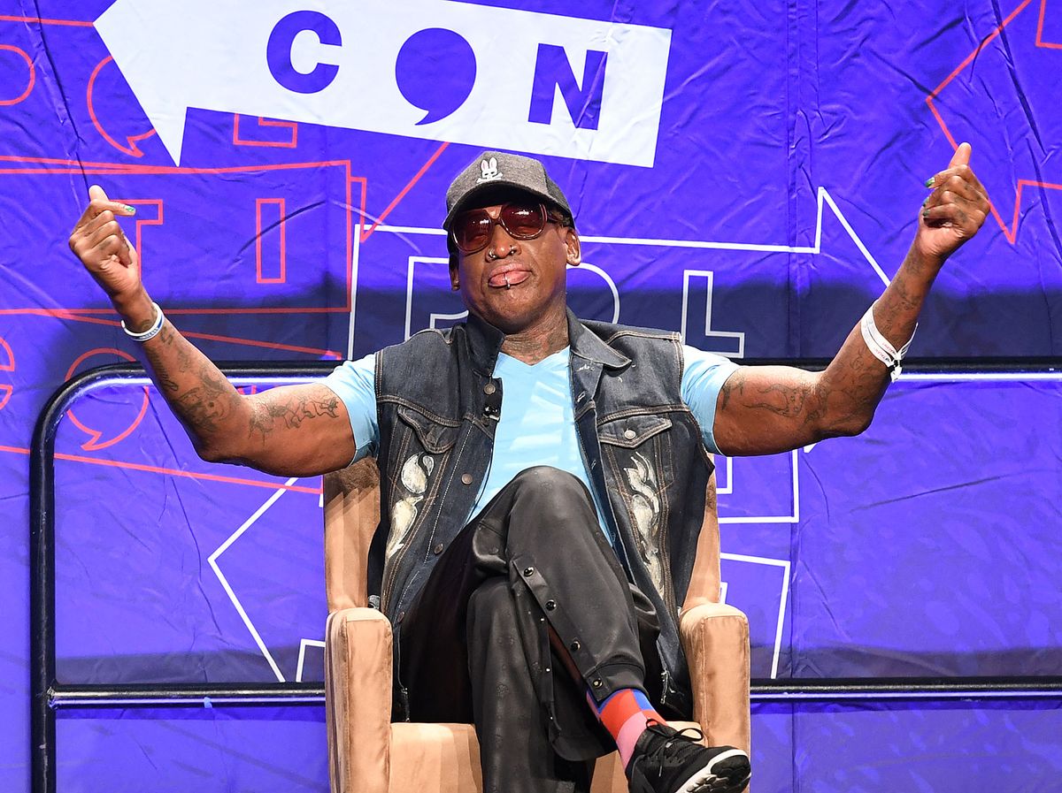 Basketball star Dennis Rodman (R) addresses the crowd on North Korea during the "Slam Dunk Diplomacy with Dennis Rodman" panel at the 2018 Politicon in Los Angeles, California on October 20, 2018. - The two day event covers all things political with dozens of high profile political figures. (Photo by Mark RALSTON / AFP)