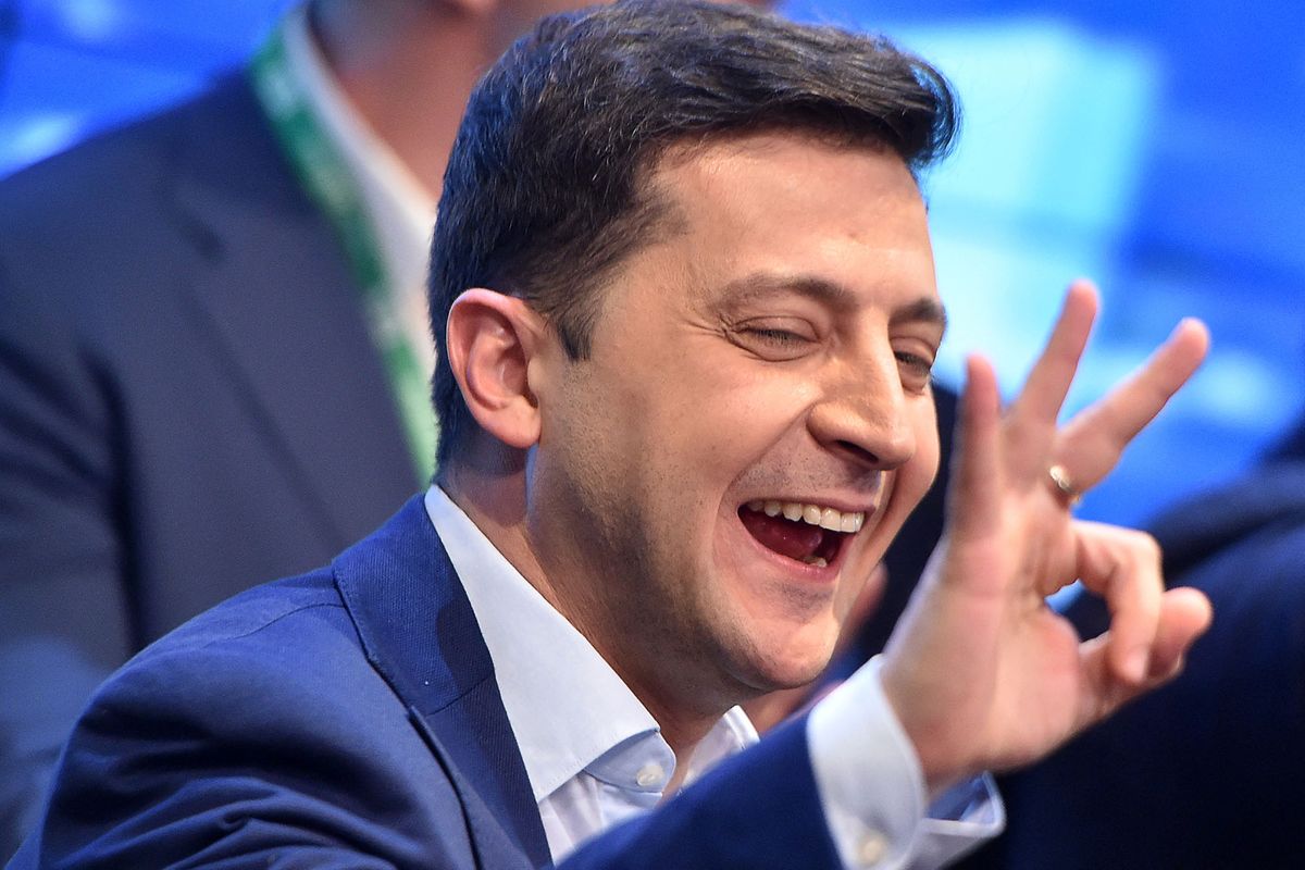 Ukrainian comedian and presidential candidate Volodymyr Zelensky reacts after the announcement of the first exit poll results in the second round of Ukraine's presidential election at his campaign headquarters in Kiev on April 21, 2019. (Photo by Sergei GAPON / AFP)