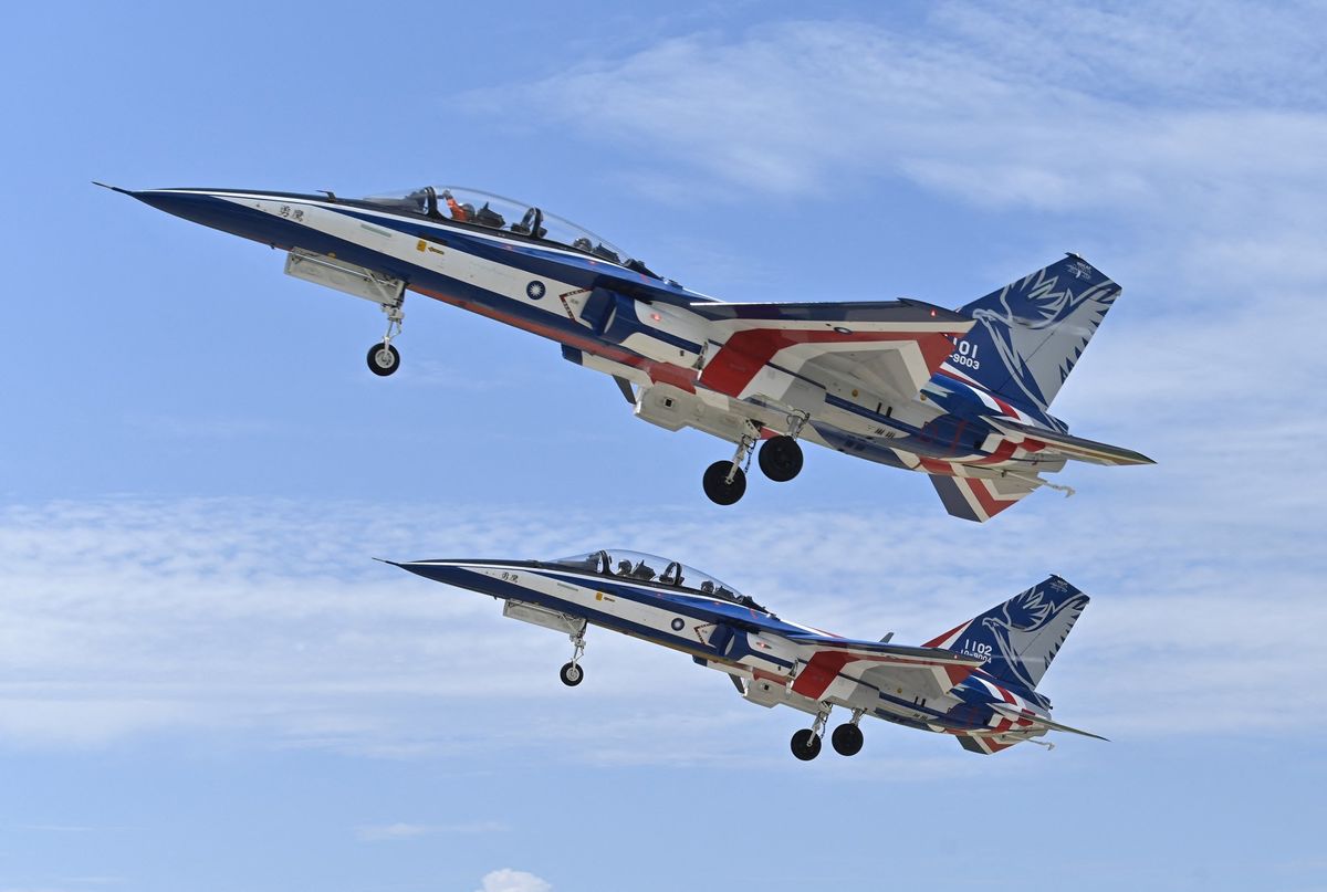 Locally-built TA-5 Brave Eagle advanced jet trainers of the Taiwanese Air Force take off in formation for a flight demonstration at an air force base in Taitung, eastern Taiwan, on July 6, 2022.
Sam Yeh / AFP
