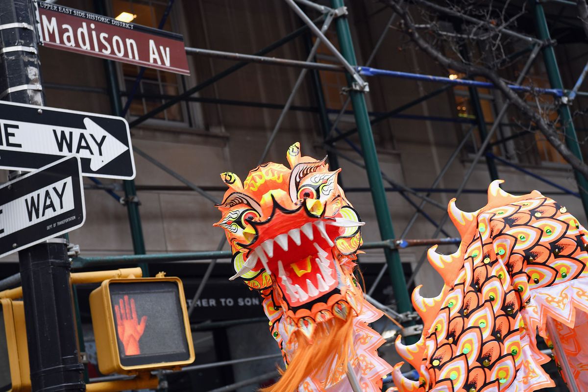 916668144 NEW YORK, NY - FEBRUARY 10:  Members of the New York United Lion and Dragon Dance Troupe perform during Madison Street To Madison Avenue: A Lunar New Year Celebration on February 10, 2018 in New York City.  (Photo by Dave Kotinsky/Getty Images for East Midtown Partnership)