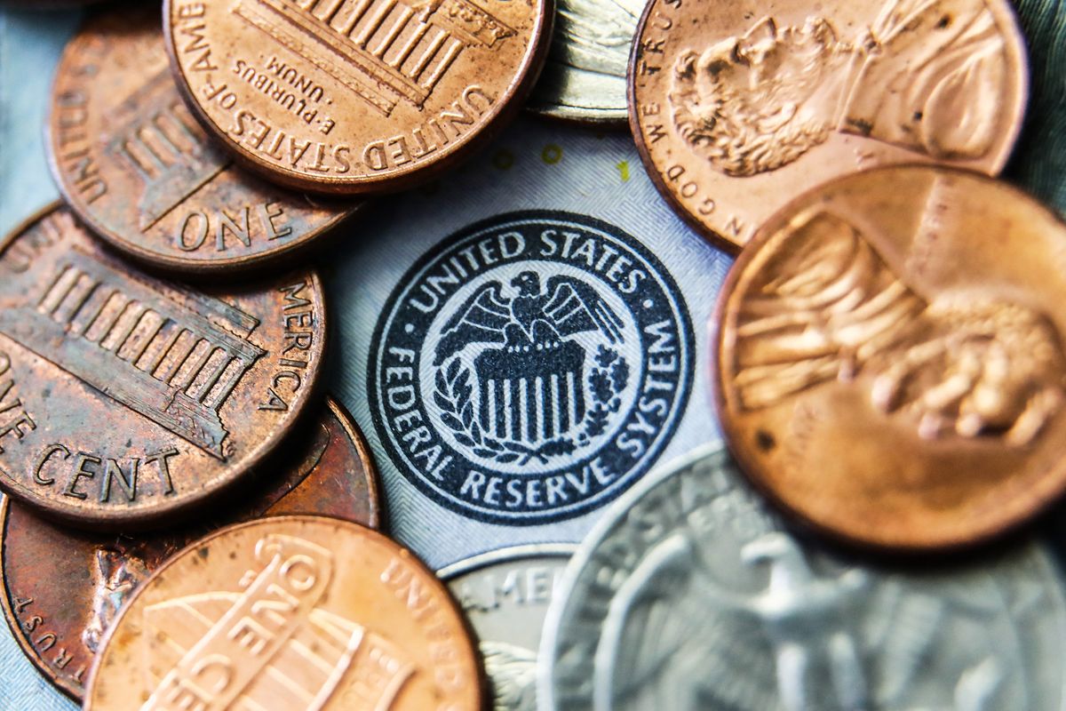 Seal of the United States Federal Reserve System on a banknote is seen with coins in this illustration photo taken in Krakow, Poland on June 13, 2022. (Photo illustration by Jakub Porzycki/NurPhoto) (Photo by Jakub Porzycki / NurPhoto / NurPhoto via AFP)