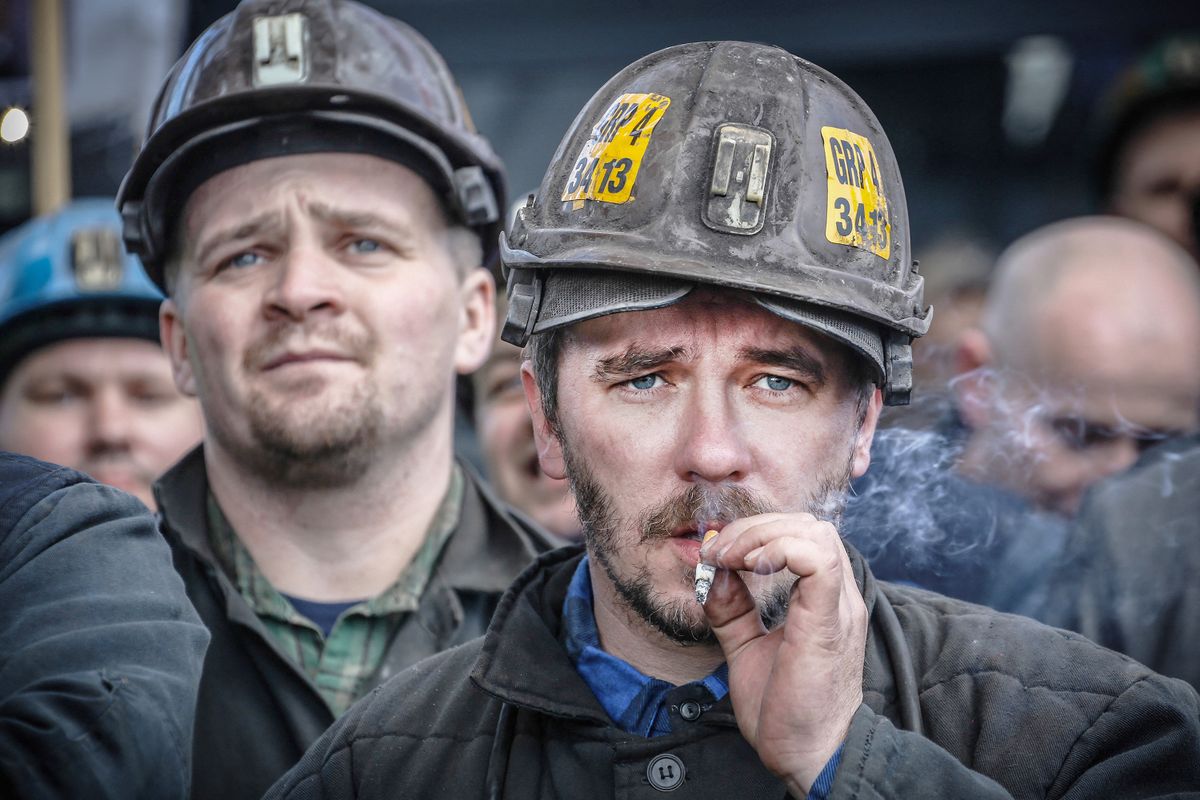 2015 Miners Strike In Poland, Miners protest in front of KWK Budryk coal mine in Ornontowice , Poland on February 3rd, 2015. After the government announced a restructuration plan for coal mines, Silesia region was rocked by a wave of protests. Miners working in mines belonging to the Kompania Weglowa coal consortium, and later those employed by Jastrzebska Spolka Weglowa began protests and went on stike fearing the loss of their jobs and privileges.   (Photo by Beata Zawrzel/NurPhoto) (Photo by Beata Zawrzel / NurPhoto / NurPhoto via AFP)
