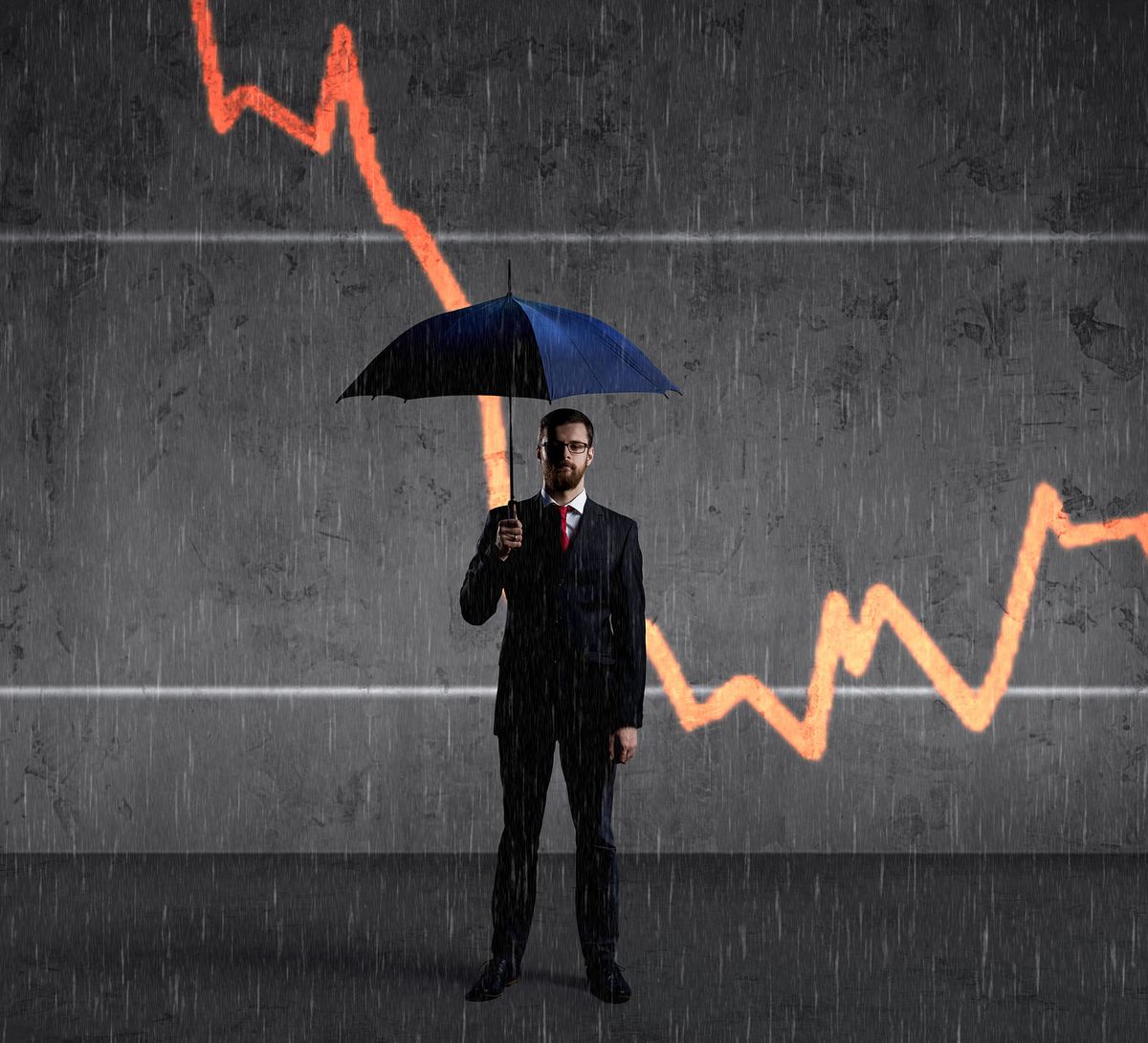Businessman with umbrella standing over column diagram background. Business, crisis, default concept. 