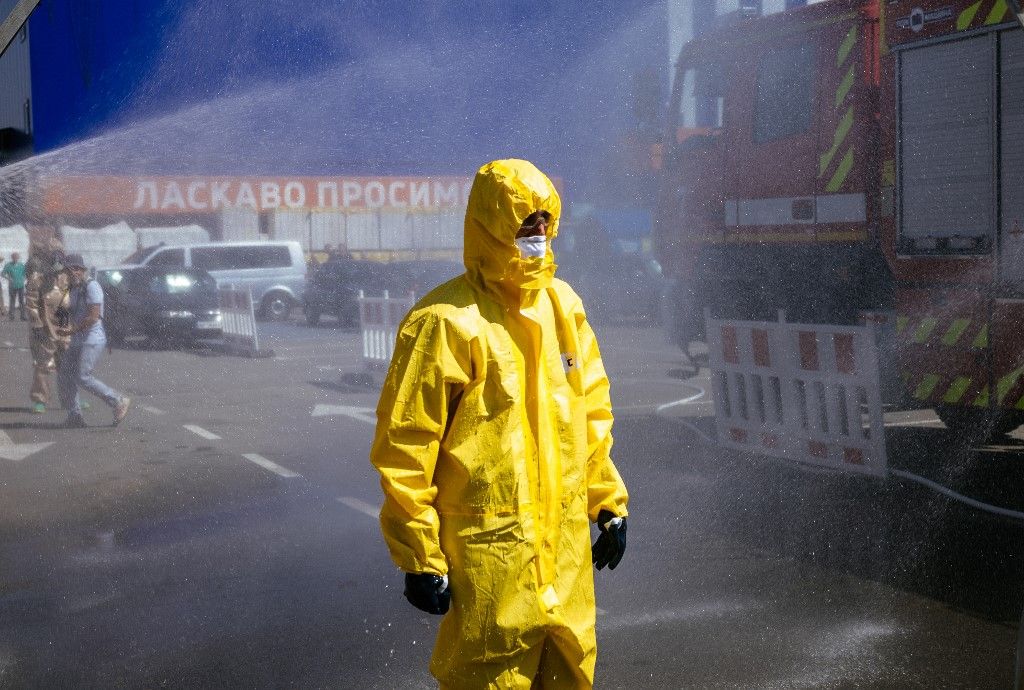 A Ukrainian Emergency Ministry rescuer attends an exercise in the city of Zaporizhzhia on August 17, 2022, in case of a possible nuclear incident at the Zaporizhzhia nuclear power plant located near the city. - Ukraine remains deeply scarred by the 1986 Chernobyl nuclear catastrophe, when a Soviet-era reactor exploded and streamed radiation into the atmosphere in the country's north. The Zaporizhzhia nuclear power plant in southern Ukraine was occupied in the early days of the war and it has remained in Russian hands ever since.