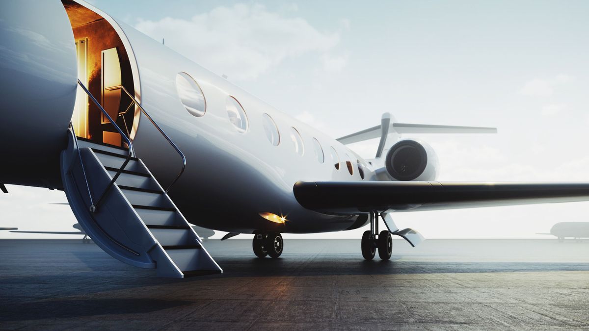 Closeup,View,Of,Private,Jet,Airplane,Parked,At,Outside,And