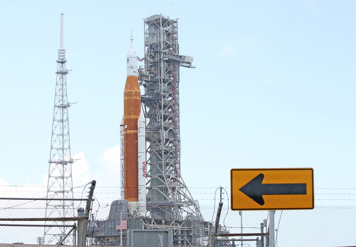A view of the massive Artemis I Space Launch System rocket and Orion spacecraft at Launch Pad 39B after rolling out from the Vehicle Assembly Building for a second time at the Kennedy Space Center in Florida on June 6, 2022. - NASA will attempt a second wet dress rehearsal to load propellant into the rocket’s tanks and perform a full launch countdown later this month. NASA teams assessed a liquid hydrogen system leak and support hardware which hampered the first rollout rehearsal last March. An uncrewed mission will make the first flight of the SLS rocket and Orion spacecraft before returning astronauts to the lunar surface for the first time since 1972