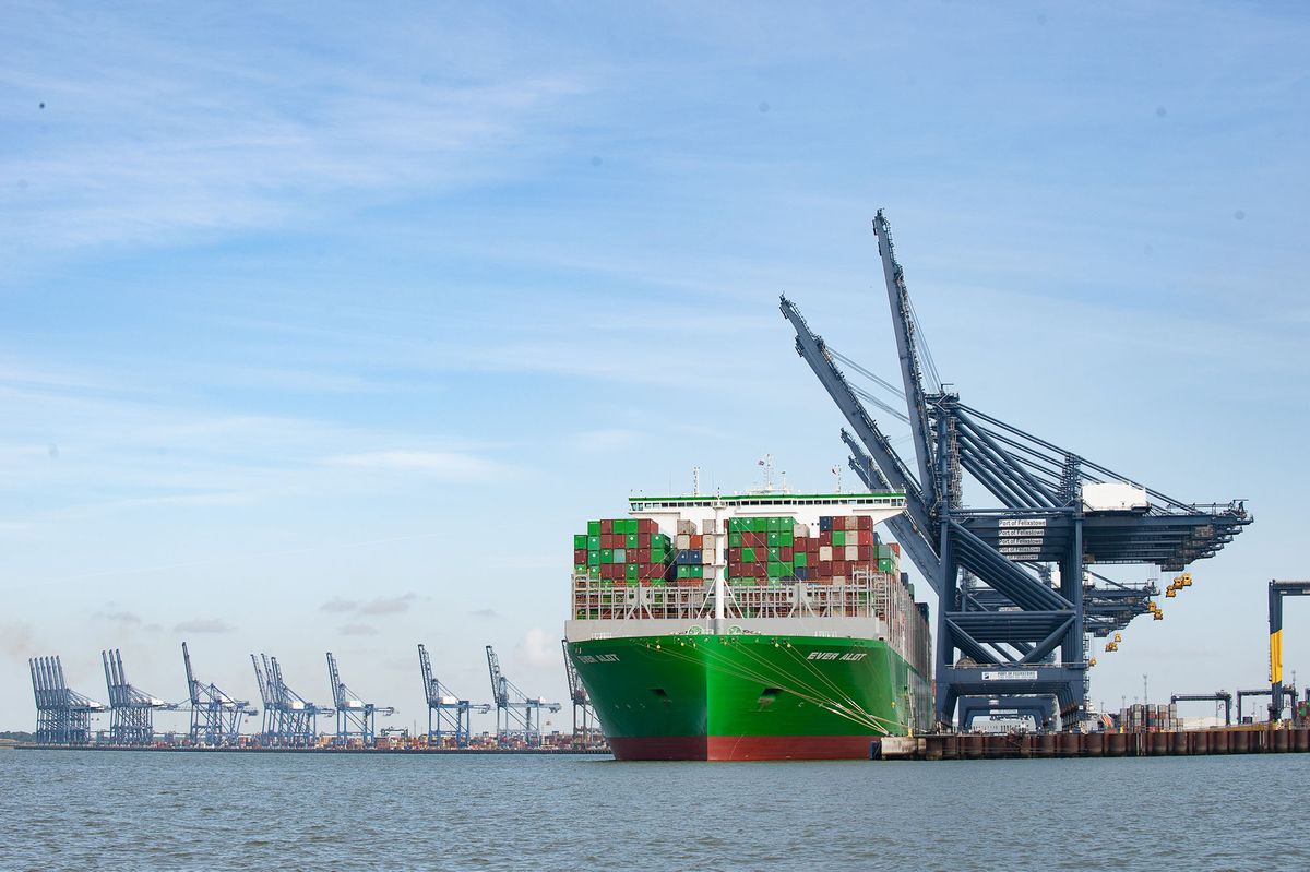 1416349770 FELIXSTOWE, SUFFOLK - AUGUST 21: A container ship waits to be unloaded by idle gantries as an eight day strike, called by the UNITE trade union begins over pay at the port of Felixstowe on August 21, 2022 in Felixstowe, England. (Photo by Guy Smallman/Getty Images)