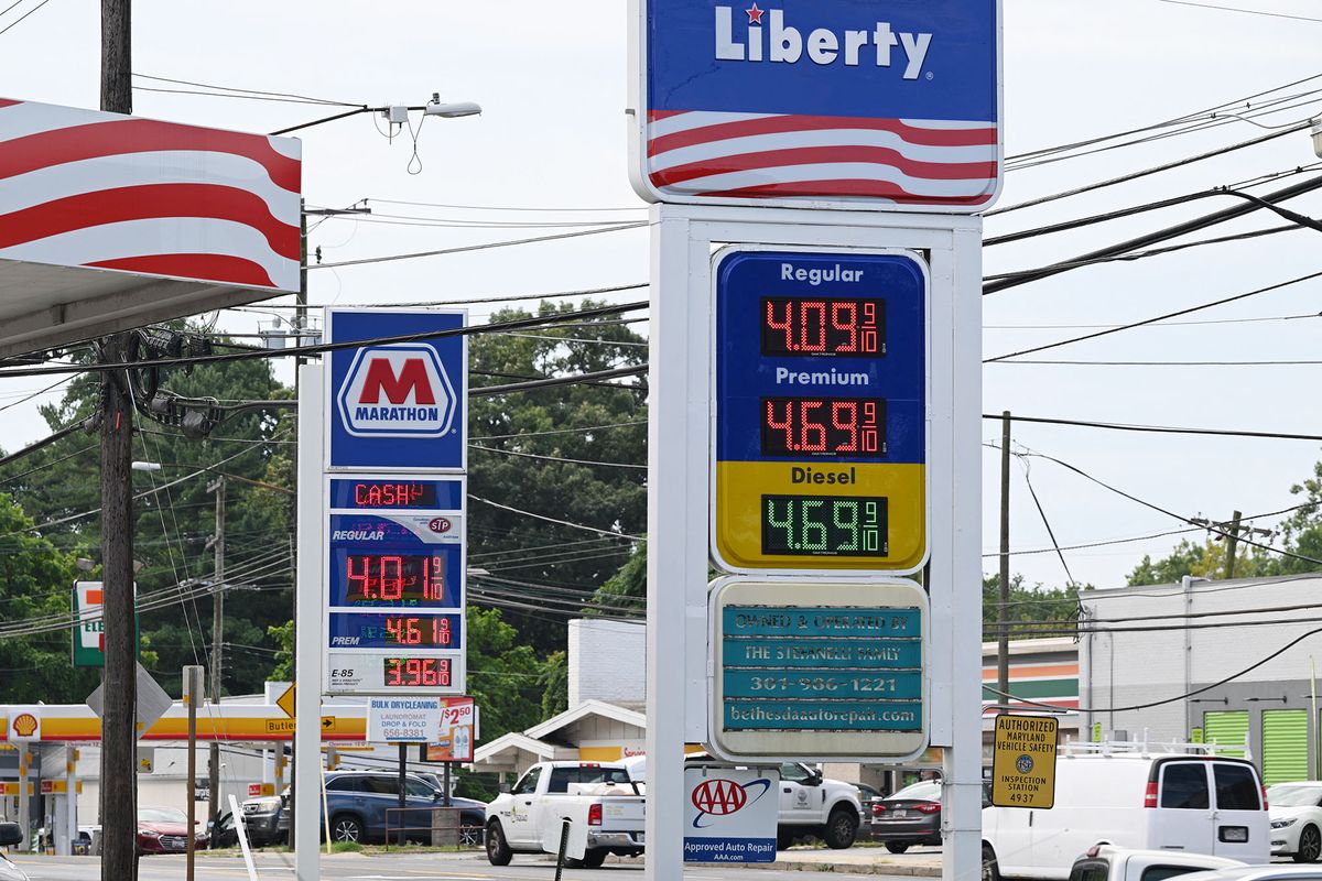  Gas station prices are seen in Bethesda, Maryland on August 11, 2022. - The US average price of gasoline at the pump has finally fallen below $4.00 a gallon, providing a bit of relief for Americans struck by massive inflation at almost every turn. (Photo by MANDEL NGAN / AFP)