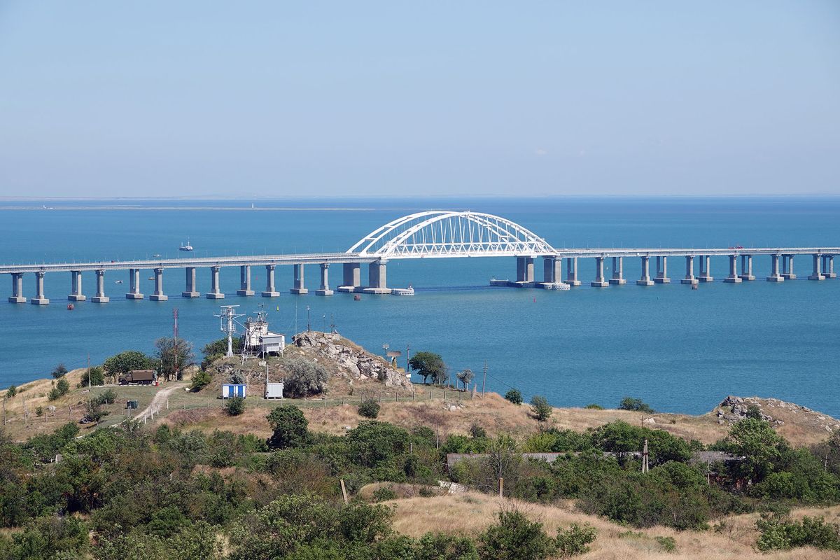 1171391410 26 July 2019, Russia, Kertsch: The Crimean bridge between Kerch on the Crimean peninsula and the Russian heartland, built under protest of Ukraine and the international community. In addition to the motorway, tracks will also be laid on a parallel bridge. The train service is scheduled to start at the end of the year. Sanctions and high prices, but also major projects and hope: five years after the annexation of the Crimea, Russia is expanding its power on the Black Sea peninsula. (to dpa-story: "Russian" life in Crimea) Photo: Ulf Mauder/dpa (Photo by Ulf Mauder/picture alliance via Getty Images)